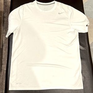 White dri -fit Nike shirt size Large loose fit!